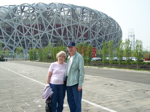 Heather's parents in front of the "Birds' Nest"