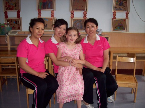 Hannah with her teachers